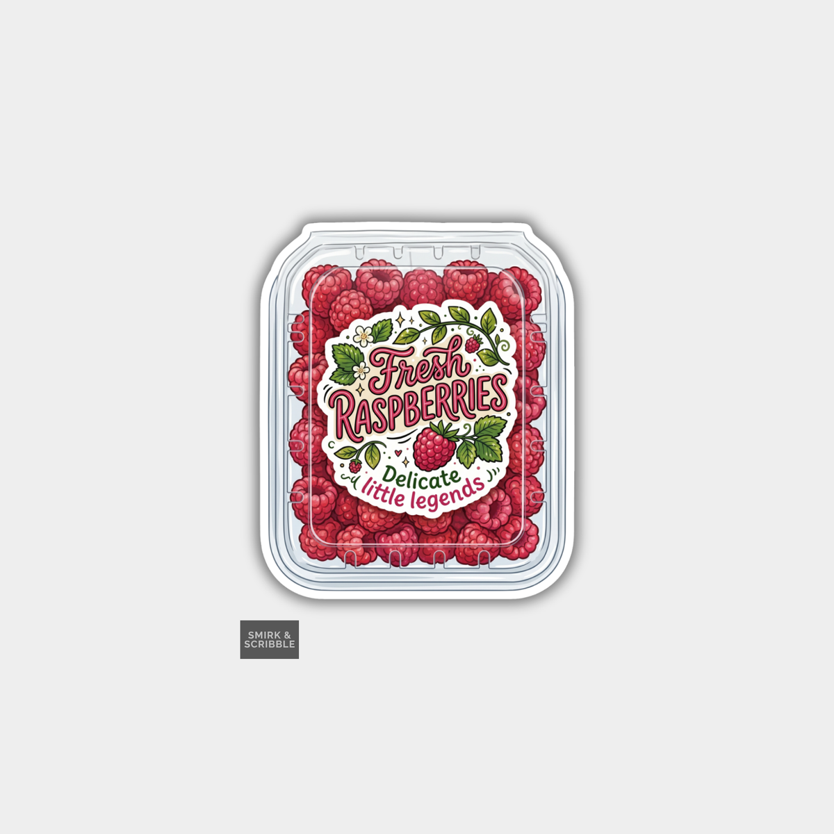 Packaging of fresh raspberries with decorative label on a light gray background