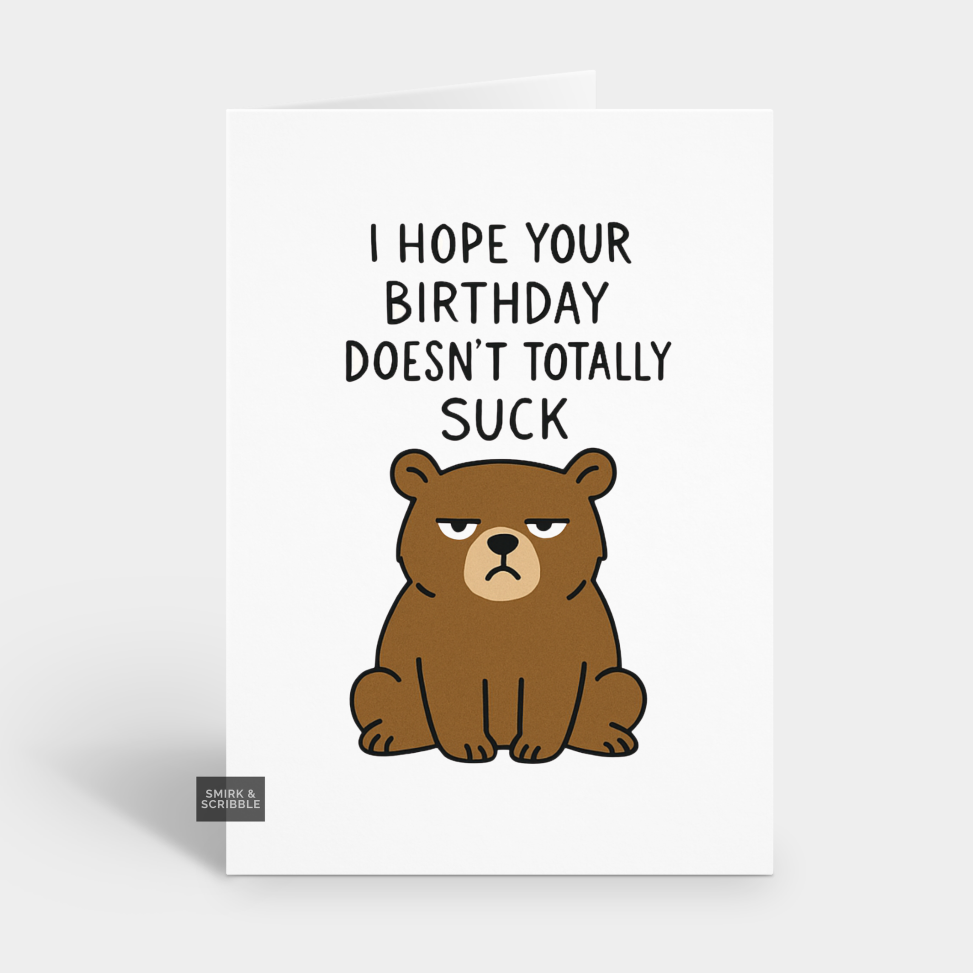 Cartoon bear with humorous birthday message on a white background