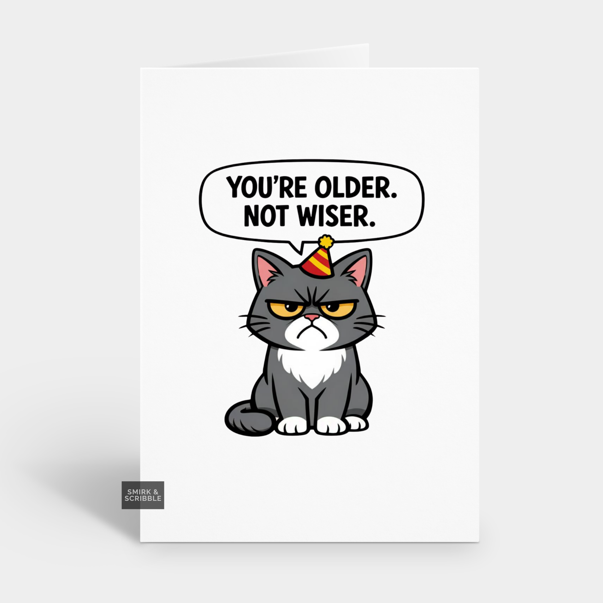 Cartoon cat with a birthday hat and speech bubble on a white background